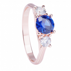 Anillo de compromiso oro rosa 18k. con zafiro y diamantes