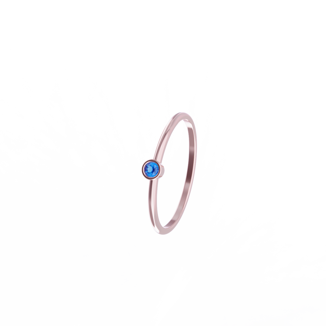 Rose gold ring with sapphire